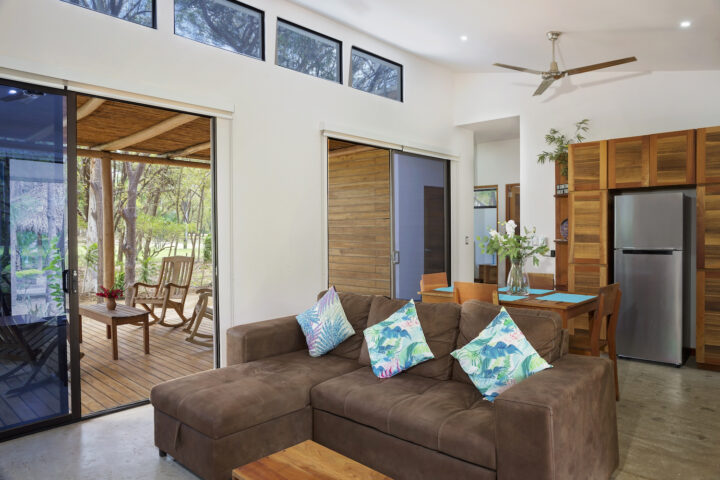 Invest_Nicaragua_Real_Estate_Tola_Eco_Casita_6_Living_Dining_Area_CC_HIGH_RES-720×480-1